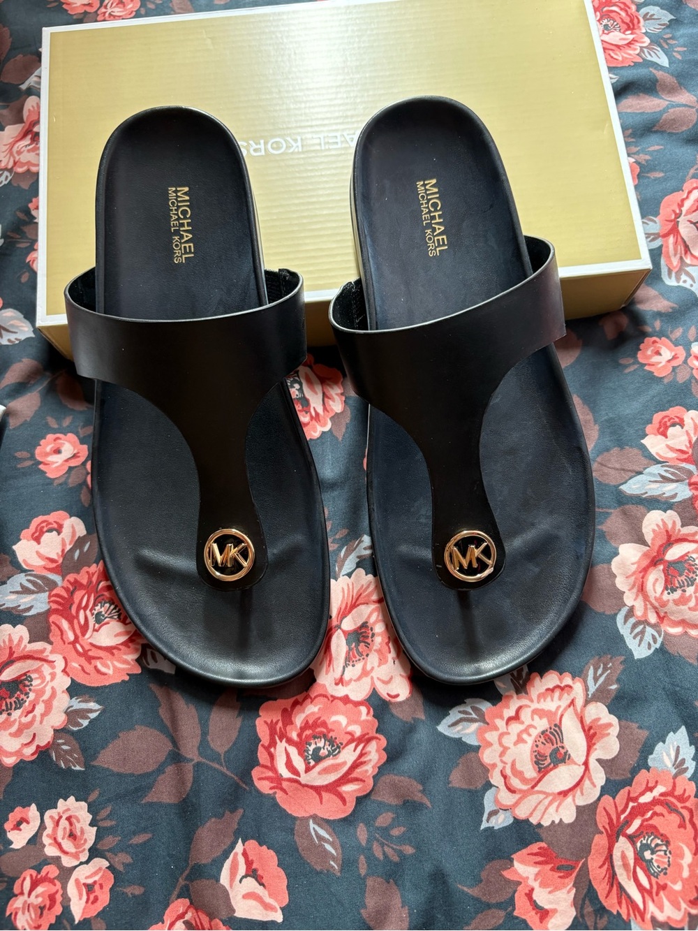 Michael Kors Black Thong Sandals with Gold MK Medallion
